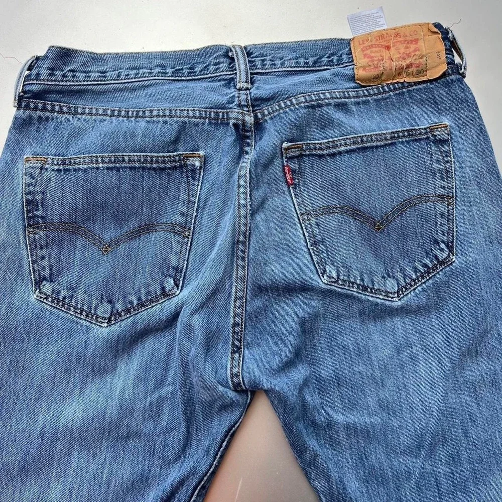 Levi's 501 blue jeans distressed